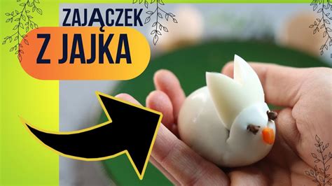 Grafika przedstawiająca boginię Ostara z symbolami jajka i zająca