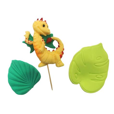 figurki misiów i dinozaurów na tort