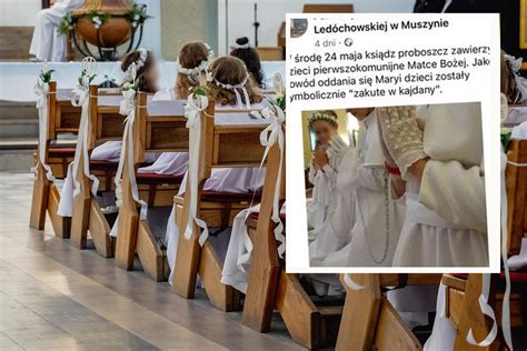 Dzieci w białych strojach podczas uroczystości Pierwszej Komunii Świętej