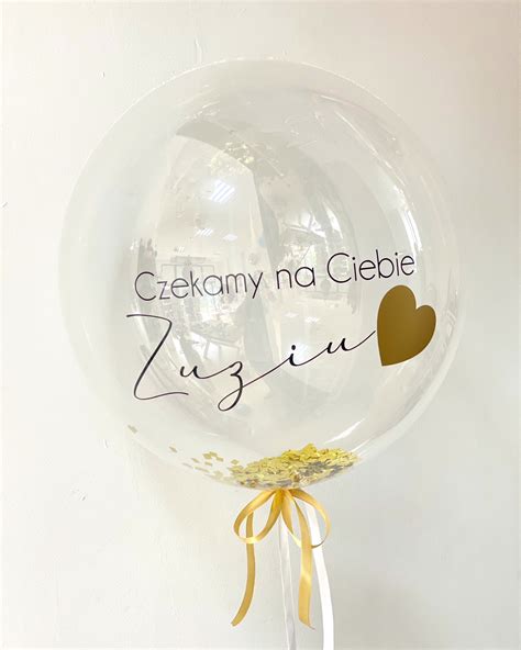 Ilustracja przedstawiająca balon z napisem
