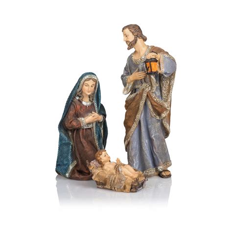 Zbliżenie na figurki Maryi, Józefa i górnika stojące przy Dzieciątku Jezus w wagoniku.