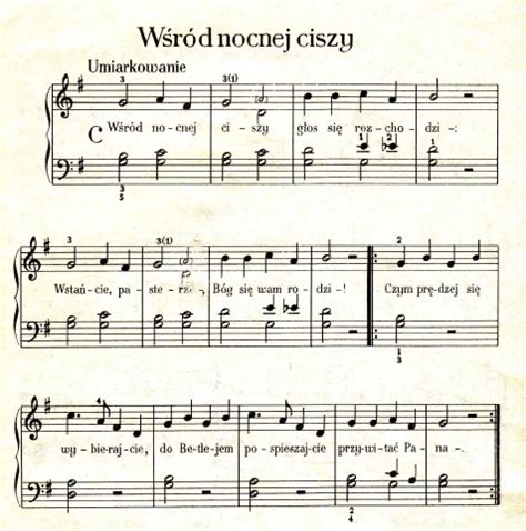 Grafika przedstawiająca nuty i akordy do kolęd.