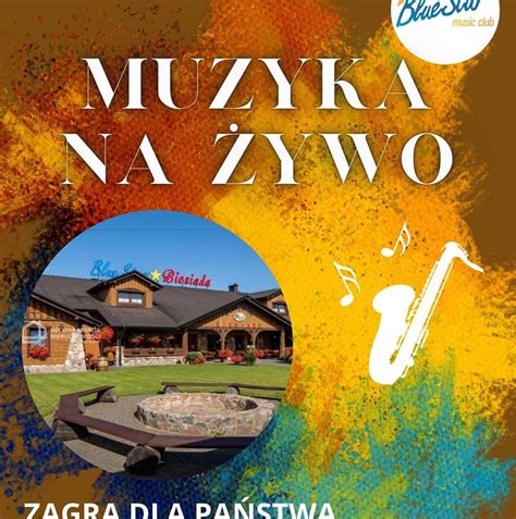 fotografia z festiwalu na Kotelnicy, prezentująca scenę z zespołem i bawiących się ludzi
